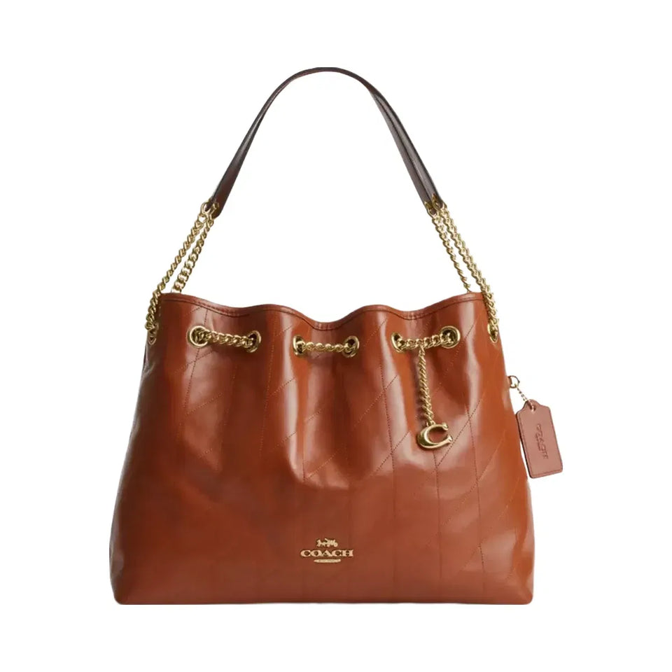 Coach Evelyn Shoulder Bag With Quilting And Charm in Gold Cinnamon