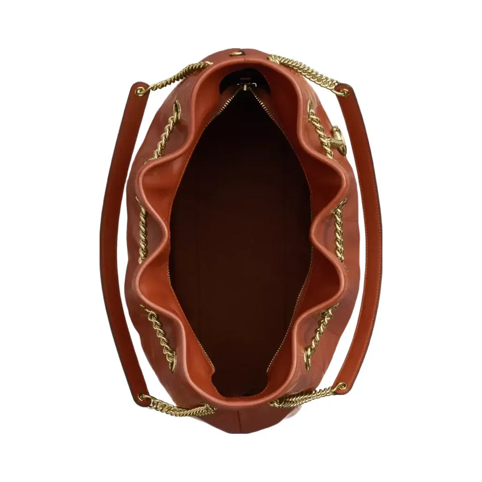 Coach Evelyn Shoulder Bag With Quilting And Charm in Gold Cinnamon