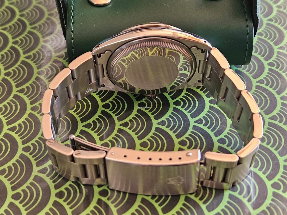 Rolex | Oyster Perpetual | 1500 | Steel | 34 mm | Steel | Black | Automatic