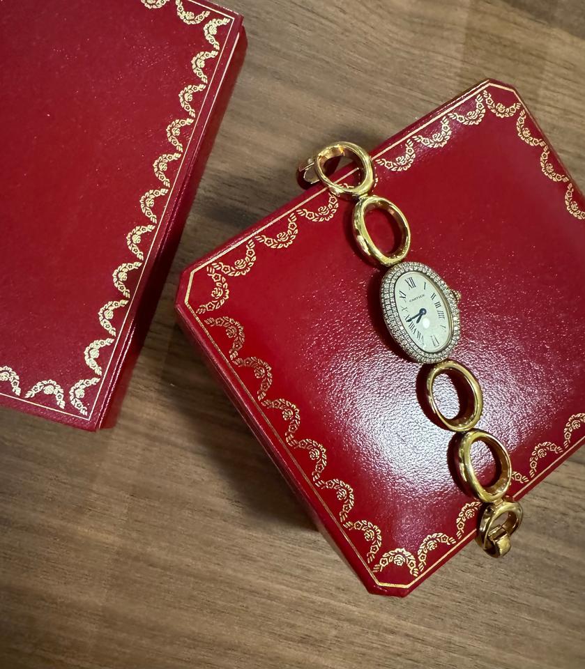 Cartier Baignoire REF.1967 AN ATTRACTIVE GOLD AND DIAMOND-SET BRACELET WATCH Rare