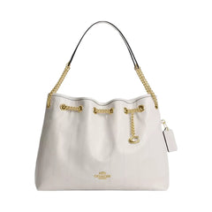 Coach Evelyn Shoulder Bag With Quilting And Charm in Gold Chalk