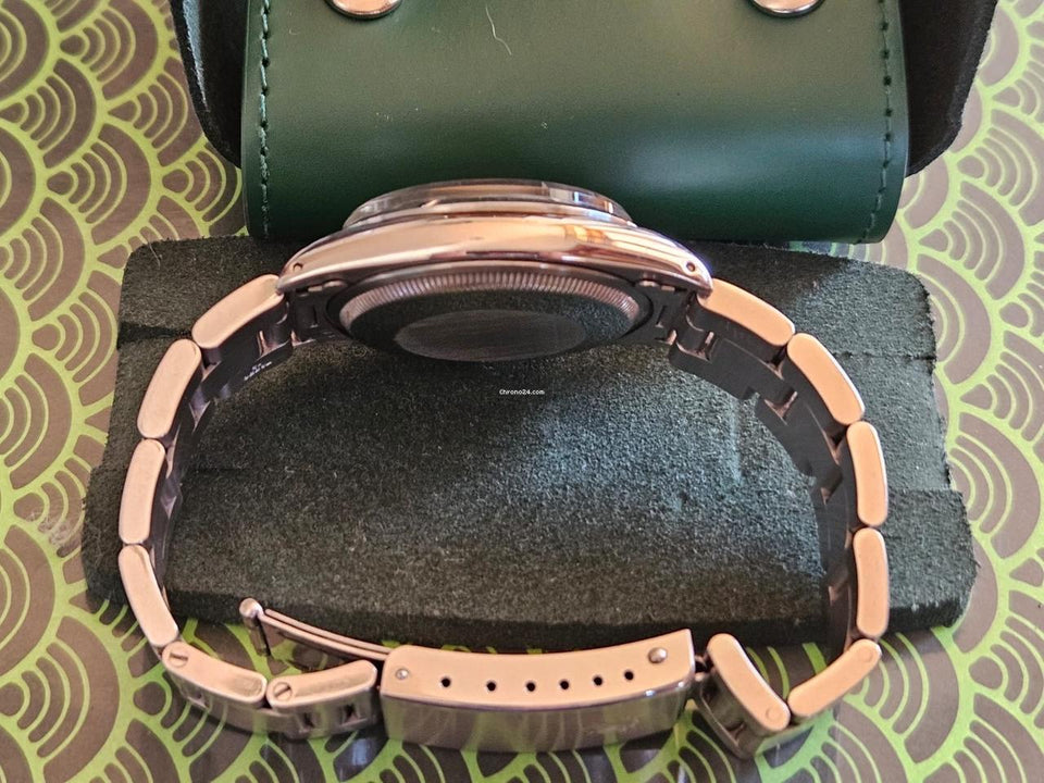 Rolex | Oyster Perpetual | 1500 | Steel | 34 mm | Steel | Black | Automatic