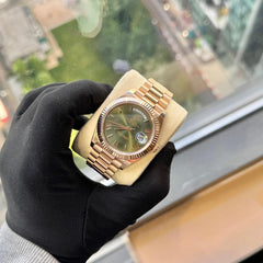 Rolex | Day-Date | 228235 | Rose gold | 40 mm | Rose gold | Green | Automatic